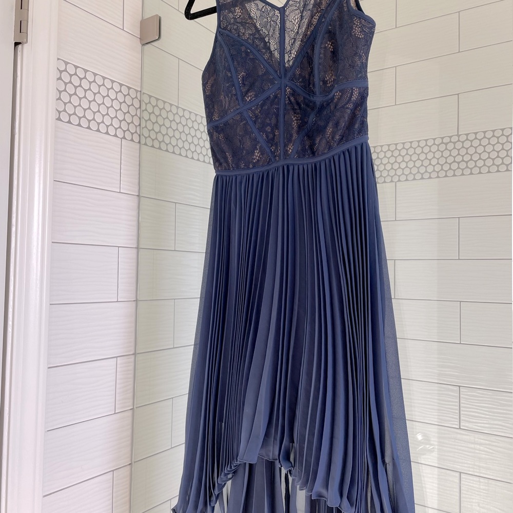 BCBG Paris. Pleated navy dress. Size 0. One of a kind for the fashionista !